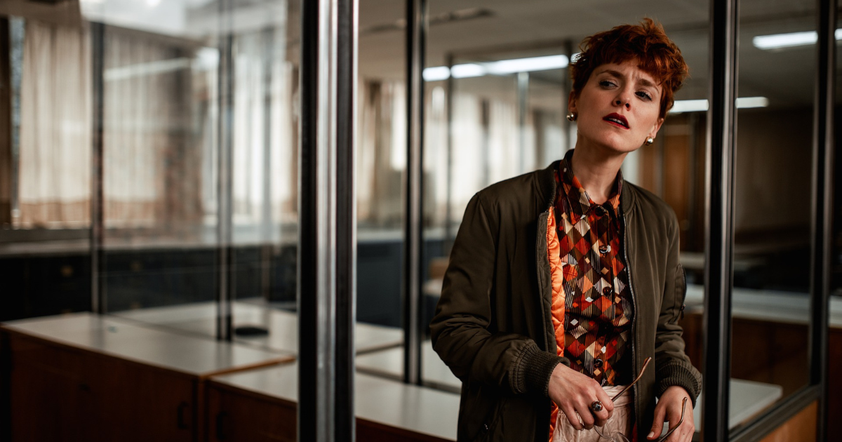 Woman in an office looking skeptical